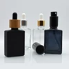 /product-detail/wholesale-usa-market-empty-30ml-matte-black-square-rectangle-clear-rectangular-glass-dropper-bottles-for-e-liquid-essential-oil-60806835280.html