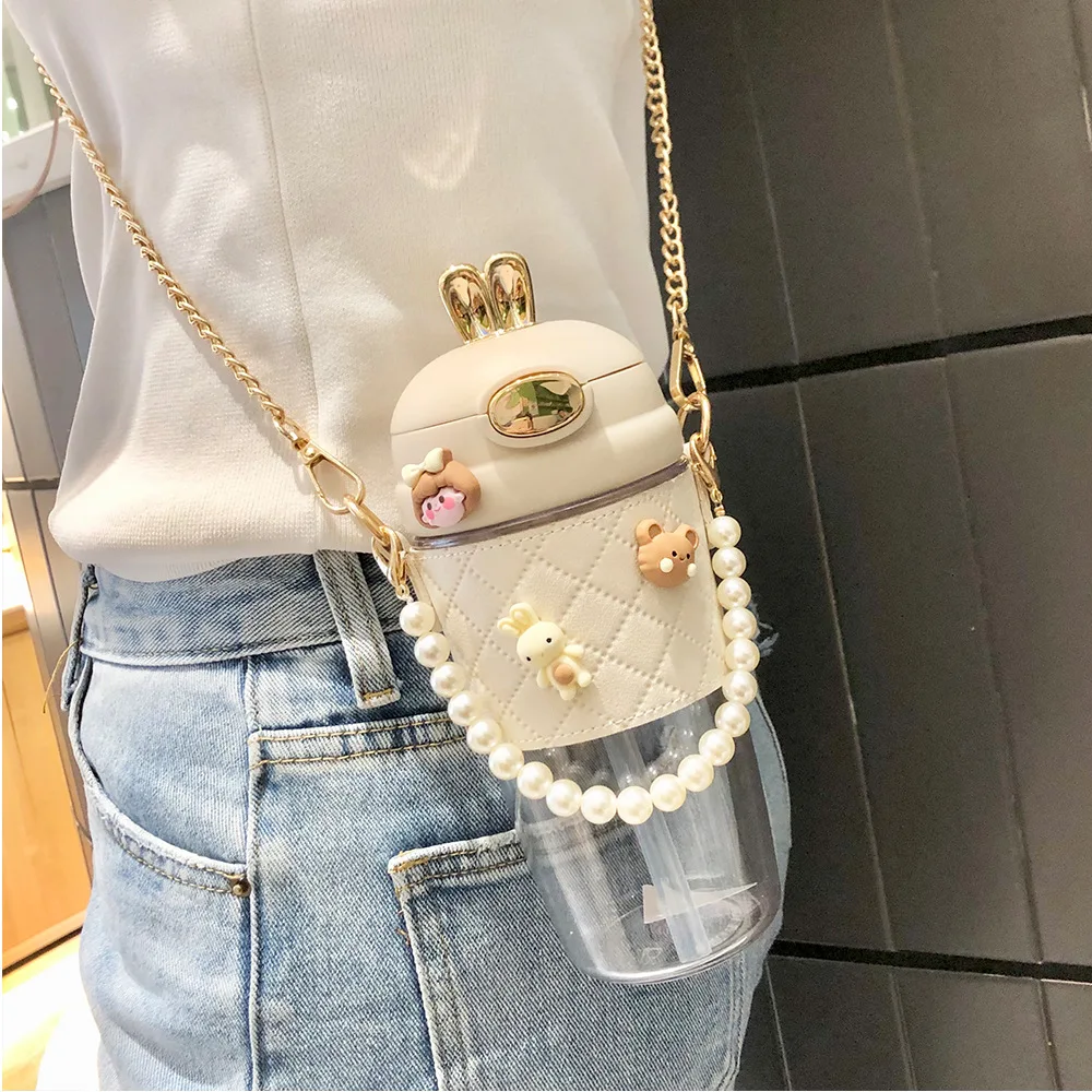 380ml 580ml Ins Cute Rabbit Ear Pearls Plastic Girls Kids Water Bottle Cup With Straw Portable metal chain Strap
380ml 580ml Ins Cute Rabbit Ear Pearls Plastic Girls Kids Water Bottle Cup With Straw Portable metal chain Strap