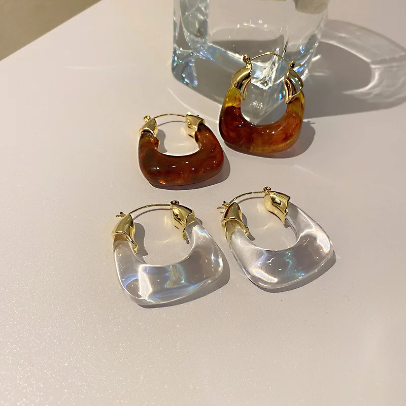 Delicate Simple Geometric Transparent Resin Acetate Hoop Earrings Gold Plated Acrylic U Shape Earrings for Women Party
Delicate Simple Geometric Transparent Resin Acetate Hoop Earrings Gold Plated Acrylic U Shape Earrings for Women Party