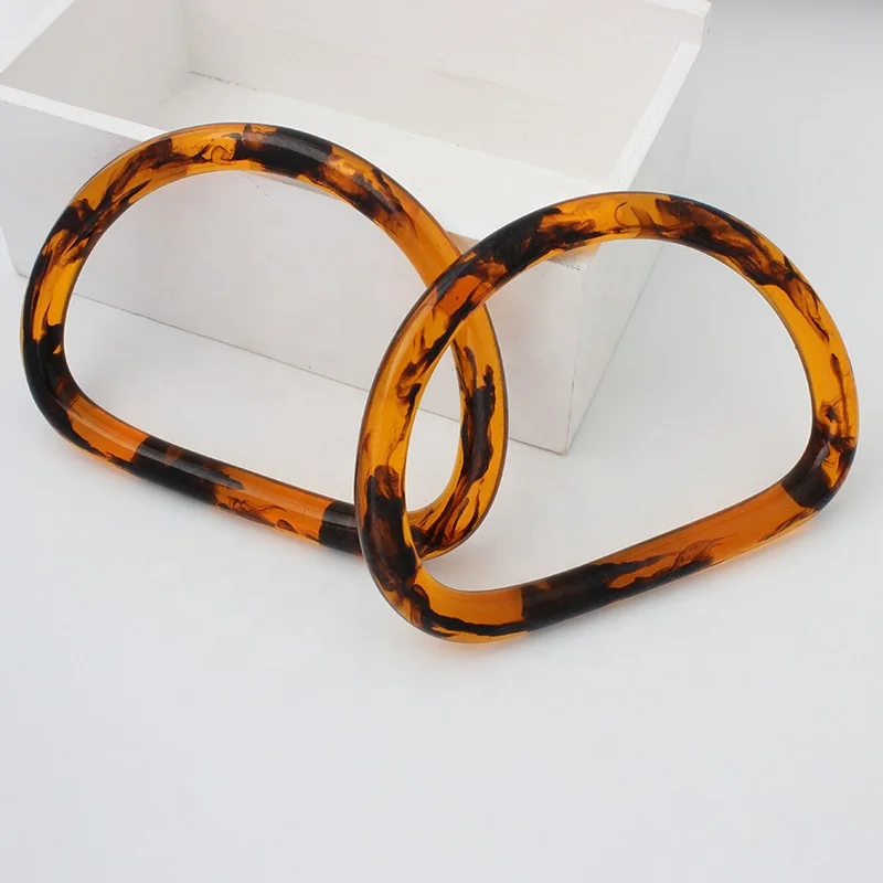 Nolvo World semi circle amber new fashion resin bag handle D shaped purse handle women bag handles parts bag accessory
Nolvo World semi circle amber new fashion resin bag handle D shaped purse handle women bag handles parts bag accessory