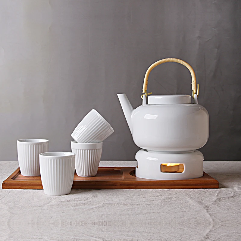 porcelain heat resisting tea coffee & tea sets port High Borosilicate ceramic Tea pot with candle stand
porcelain heat resisting tea coffee & tea sets port High Borosilicate ceramic Tea pot with candle stand