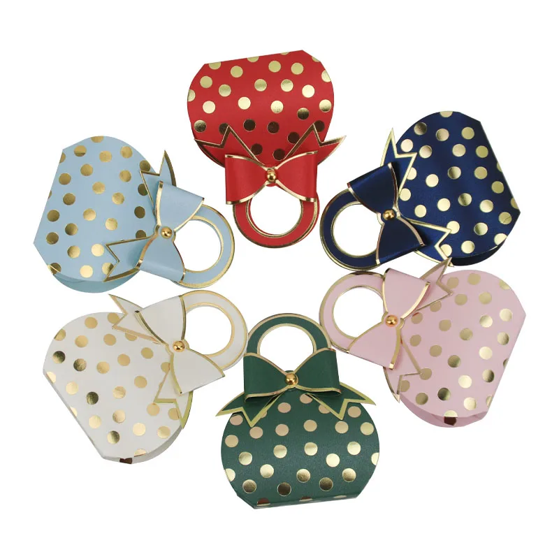 Newly design hand bag shape Dots foil stamping luxury wedding party small candy packaging paper gift box
Newly design hand bag shape Dots foil stamping luxury wedding party small candy packaging paper gift box