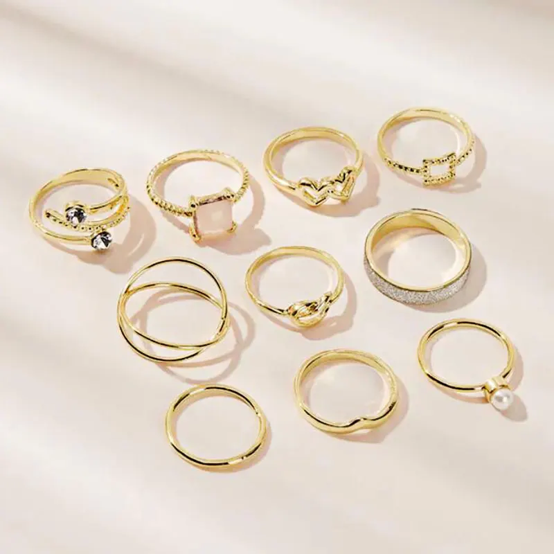 New Design Delicate Style Heart Gold Metal And Pearl And Twist Detail Ring 10pcs/Set For Women DW190329003
New Design Delicate Style Heart Gold Metal And Pearl And Twist Detail Ring 10pcs/Set For Women DW190329003