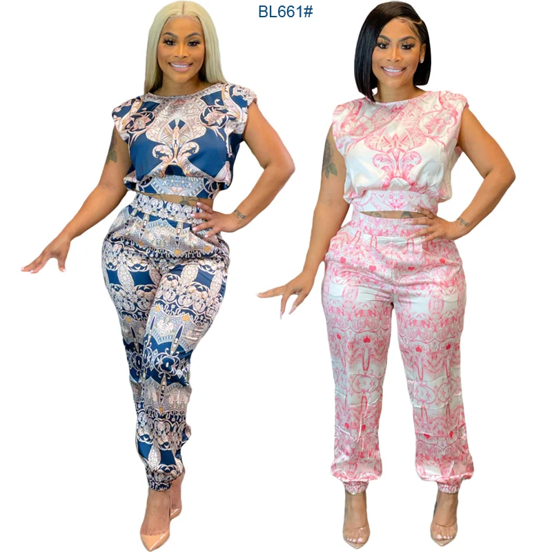 2021 new European and American women's suits printed short-sleeved shirt and trousers two-piece set, Pink / light blue
2021 new European and American women's suits printed short-sleeved shirt and trousers two-piece set, Pink / light blue