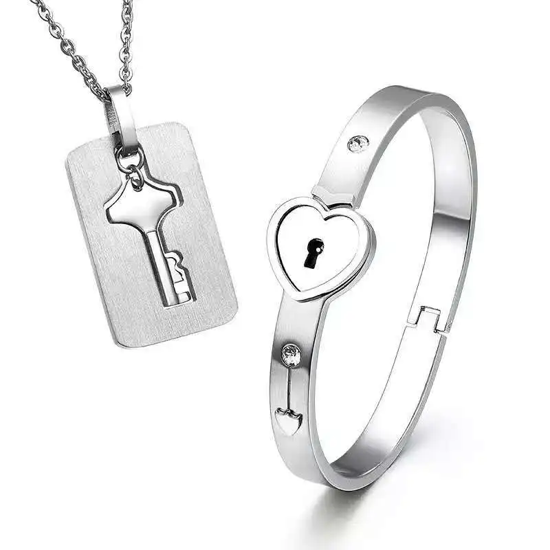 A Set Couple Fashion Titanium stainless Steel Key Bangle Bracelet and Love Lock Heart Necklace Set for Girlfriend
A Set Couple Fashion Titanium stainless Steel Key Bangle Bracelet and Love Lock Heart Necklace Set for Girlfriend