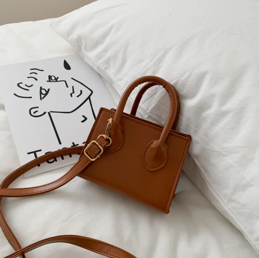 Tinny Handle Bag Women Retro Handbag PU Leather Shoulder Totes Mini Vintage Top Handle Cute Small Subaxillary Bags Clutch #1230
Tinny Handle Bag Women Retro Handbag PU Leather Shoulder Totes Mini Vintage Top Handle Cute Small Subaxillary Bags Clutch #1230