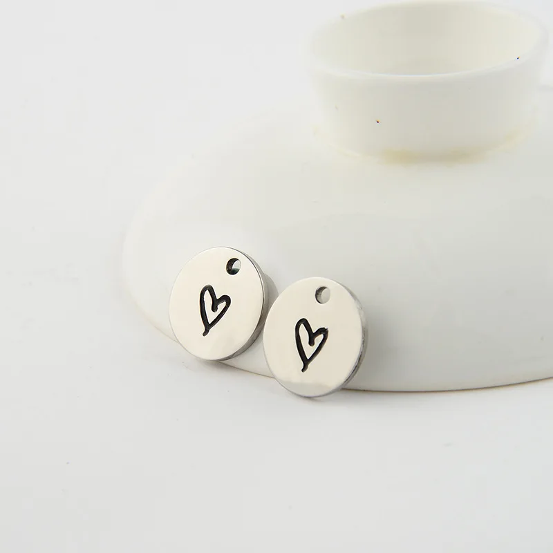 Factory custom jewelry stainless steel laser engraved logo silver charm pendant blank round metal charm for jewelry making
Factory custom jewelry stainless steel laser engraved logo silver charm pendant blank round metal charm for jewelry making