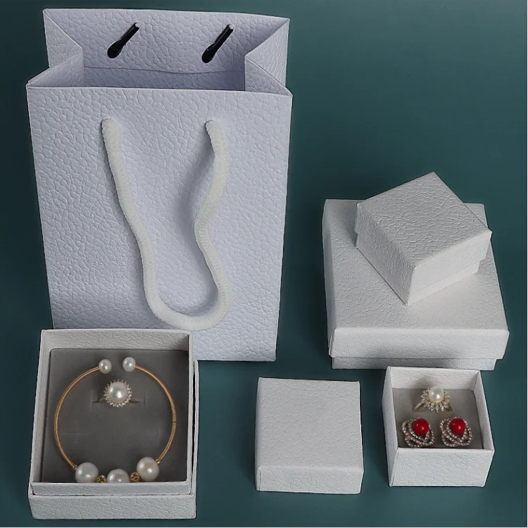 Spot luxury packaging box ring earrings bracelet boxpaper boxes for jewelry custom packaging logo
Spot luxury packaging box ring earrings bracelet boxpaper boxes for jewelry custom packaging logo