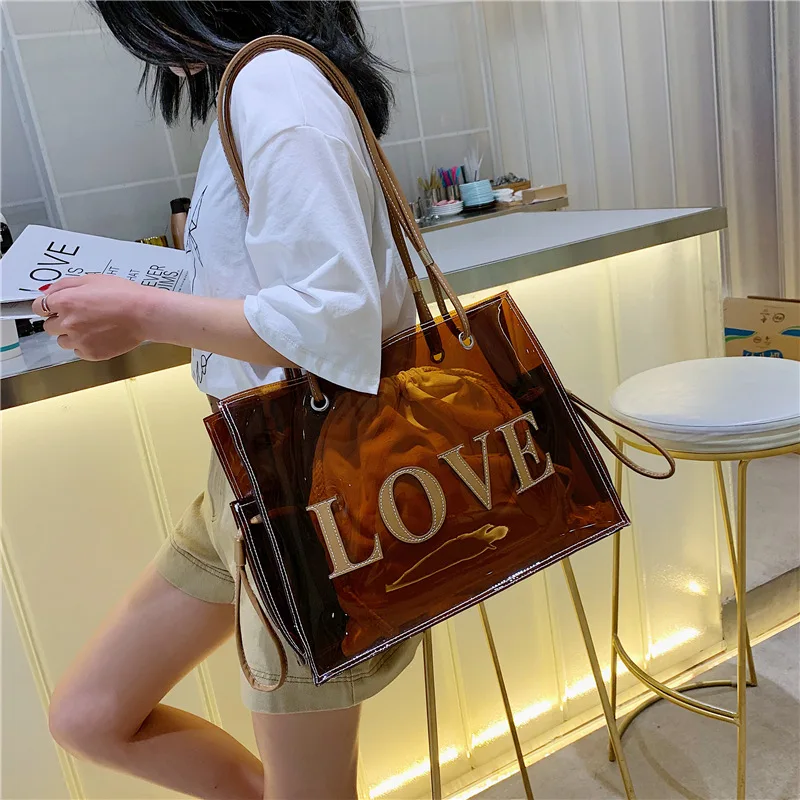 Summer trendy high quality S.iKRR designer bag plastic transparent tote handbag and purse 2 in 1 PVC jelly bag women 
Summer trendy high quality S.iKRR designer bag plastic transparent tote handbag and purse 2 in 1 PVC jelly bag women