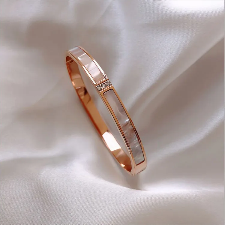 Fashion Jewelry Custom Made bracelet Korean version of white mother-of-pearl shell three Zircon titanium Steel bracelet
Fashion Jewelry Custom Made bracelet Korean version of white mother-of-pearl shell three Zircon titanium Steel bracelet