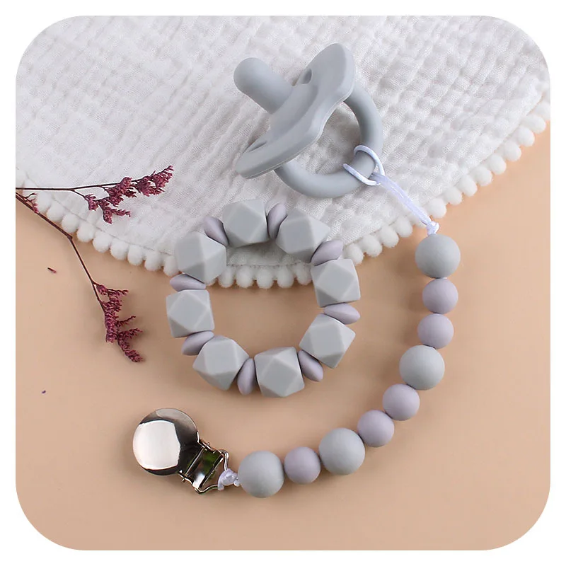 Bpa Free Pure Color Silicone Soothe Baby Pacifier Clip Teething Bracelet Baby Silicone Pacifier Set
Bpa Free Pure Color Silicone Soothe Baby Pacifier Clip Teething Bracelet Baby Silicone Pacifier Set
