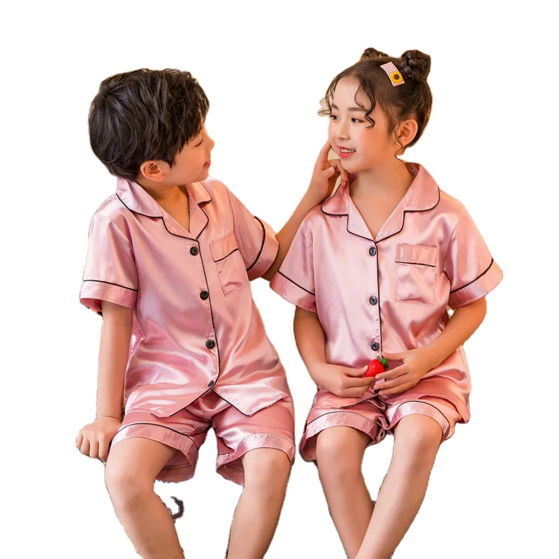 CLASSIC 2021 Summer Kids Boys & Girls Silk Pajama Sets Short Sleeve Front Button Shirt And Shorts Sleepwear For Children
CLASSIC 2021 Summer Kids Boys & Girls Silk Pajama Sets Short Sleeve Front Button Shirt And Shorts Sleepwear For Children