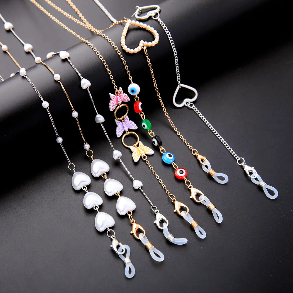 2021 Fashion Gold Butterfly Colorful Rainbow Pearl Beaded Evil Eye Glass Eyeglass Sunglasses Face Masking Chain Holder Women
2021 Fashion Gold Butterfly Colorful Rainbow Pearl Beaded Evil Eye Glass Eyeglass Sunglasses Face Masking Chain Holder Women