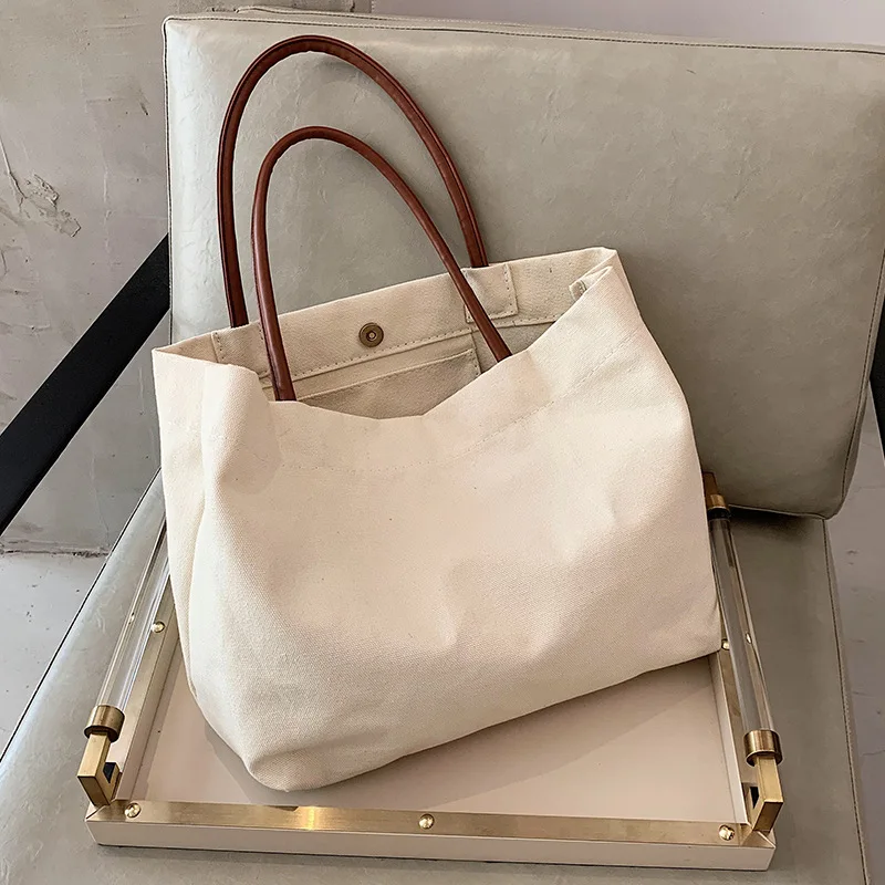 Hot Sale Korea Women Handbag High Quality Canvas Tote Bags Large Capacity Shopping Tote Bag Luxury Women Korea Bag
Hot Sale Korea Women Handbag High Quality Canvas Tote Bags Large Capacity Shopping Tote Bag Luxury Women Korea Bag