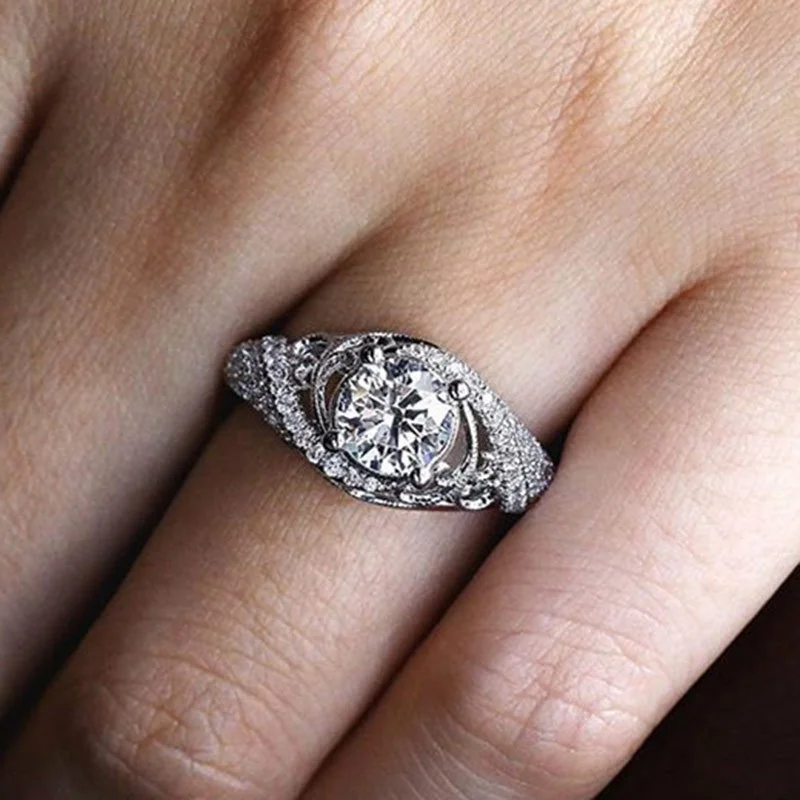 Creative Carved hollow Anniversary Rings Fashion White Cubic Zircon Wedding dinner party Women's Jewelry
Creative Carved hollow Anniversary Rings Fashion White Cubic Zircon Wedding dinner party Women's Jewelry