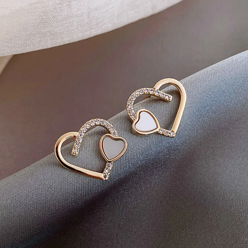 S925 silver needle heart earrings 2021 new rhinestone temperament high quality earrings earrings
S925 silver needle heart earrings 2021 new rhinestone temperament high quality earrings earrings