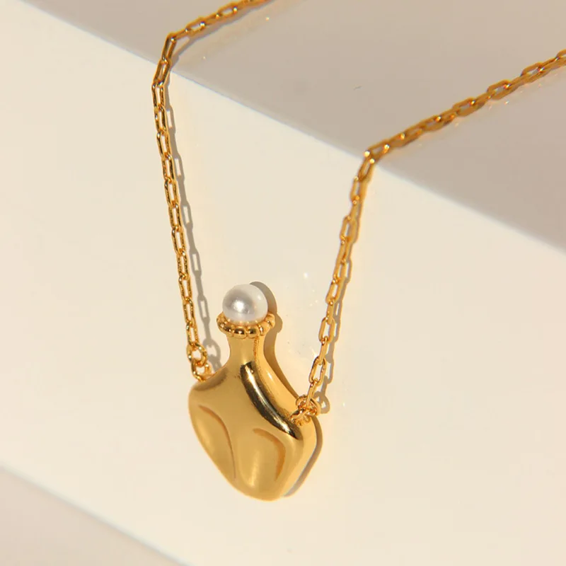 Fashion Women Vintage Jewelry Gold Plated Bottle Pendant Necklace White Pearl Kettle Pearl Pendant Necklace
Fashion Women Vintage Jewelry Gold Plated Bottle Pendant Necklace White Pearl Kettle Pearl Pendant Necklace