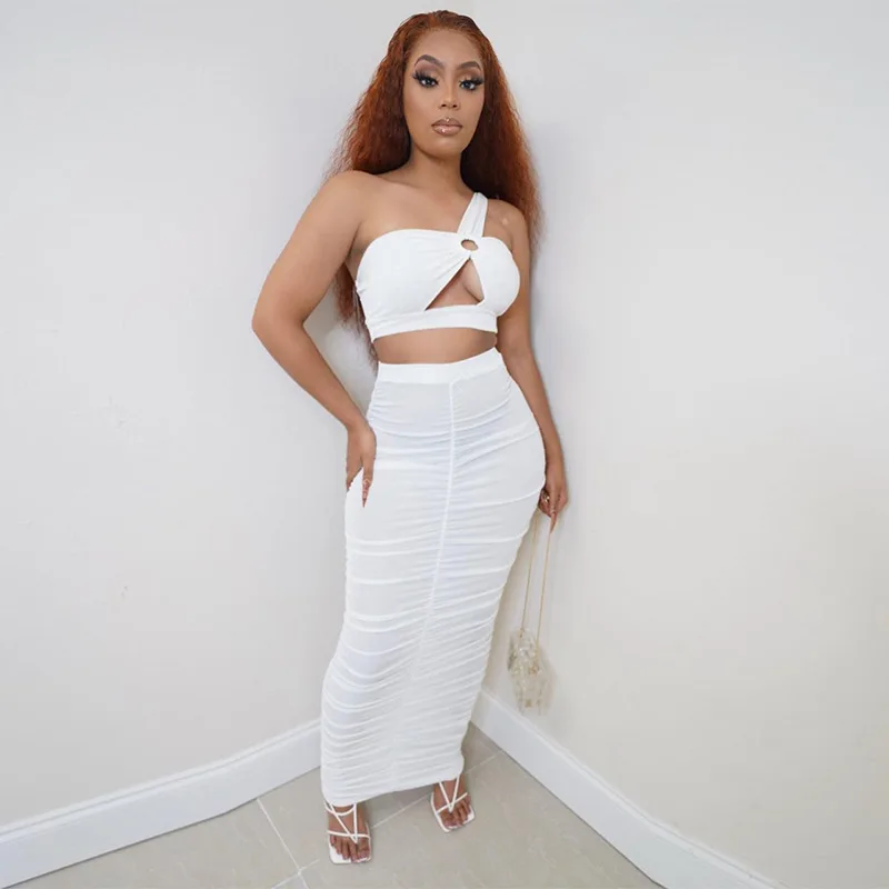 Latest Trendy Solid Hollow Out Two Piece Long Skirt Sets One Shoulder Cropped Top With Pleated Skirt Outfit, Shown
Latest Trendy Solid Hollow Out Two Piece Long Skirt Sets One Shoulder Cropped Top With Pleated Skirt Outfit, Shown