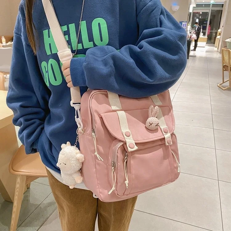 New Arrival Cute Rabbit Badge Solid Color Large Capacity Buckle Pockets Custom Logo School Teens Messenger Bag with Lamb Pendant
New Arrival Cute Rabbit Badge Solid Color Large Capacity Buckle Pockets Custom Logo School Teens Messenger Bag with Lamb Pendant