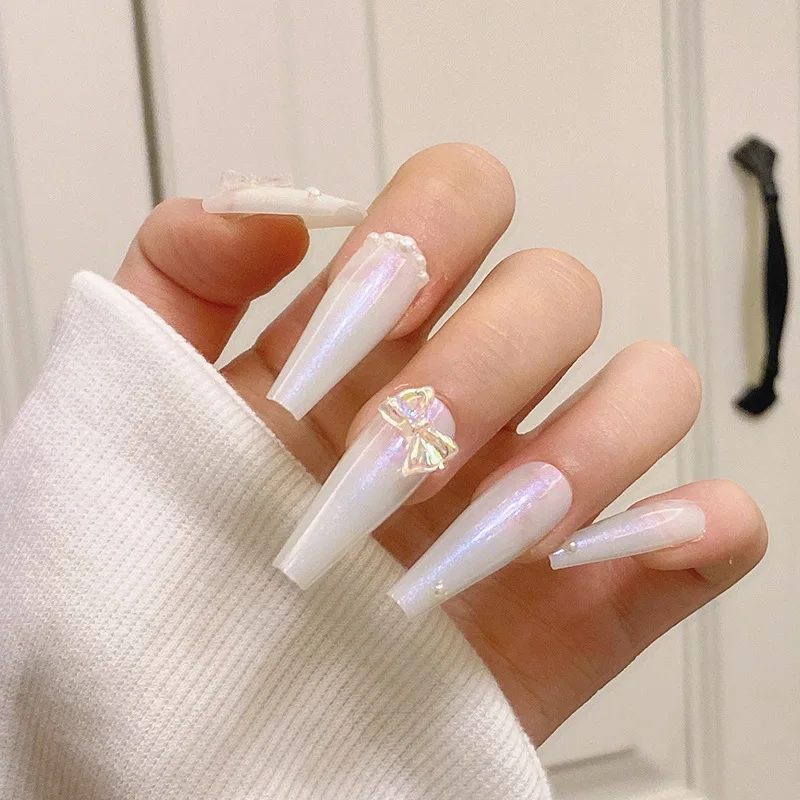Factory Wholesale Ladies Fake Nails Square Pearl Bow Decoration Pink Aurora Nail Piece Finished Product
Factory Wholesale Ladies Fake Nails Square Pearl Bow Decoration Pink Aurora Nail Piece Finished Product