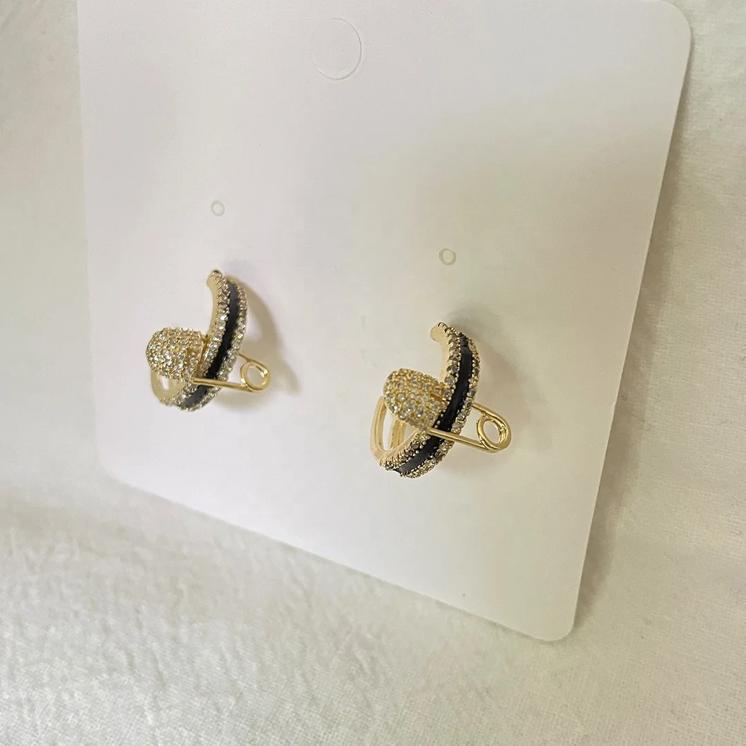 Black Enamel Safety Pin Small Hoop Earrings Cubic Zirconia Cross Earrings for Women 2021 Dainty Minimalist Real Gold Jewelry Hot
Black Enamel Safety Pin Small Hoop Earrings Cubic Zirconia Cross Earrings for Women 2021 Dainty Minimalist Real Gold Jewelry Hot