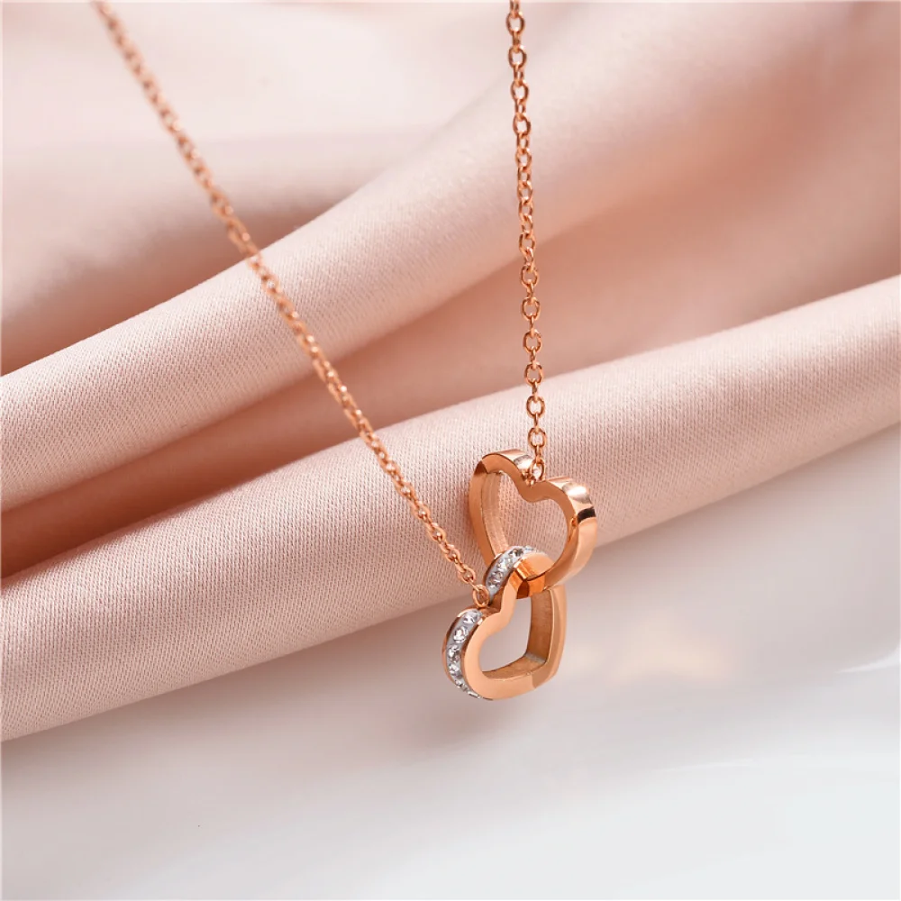 Wholesale women jewelry fashion trendy gold plated stainless steel double heart dainty necklace
Wholesale women jewelry fashion trendy gold plated stainless steel double heart dainty necklace