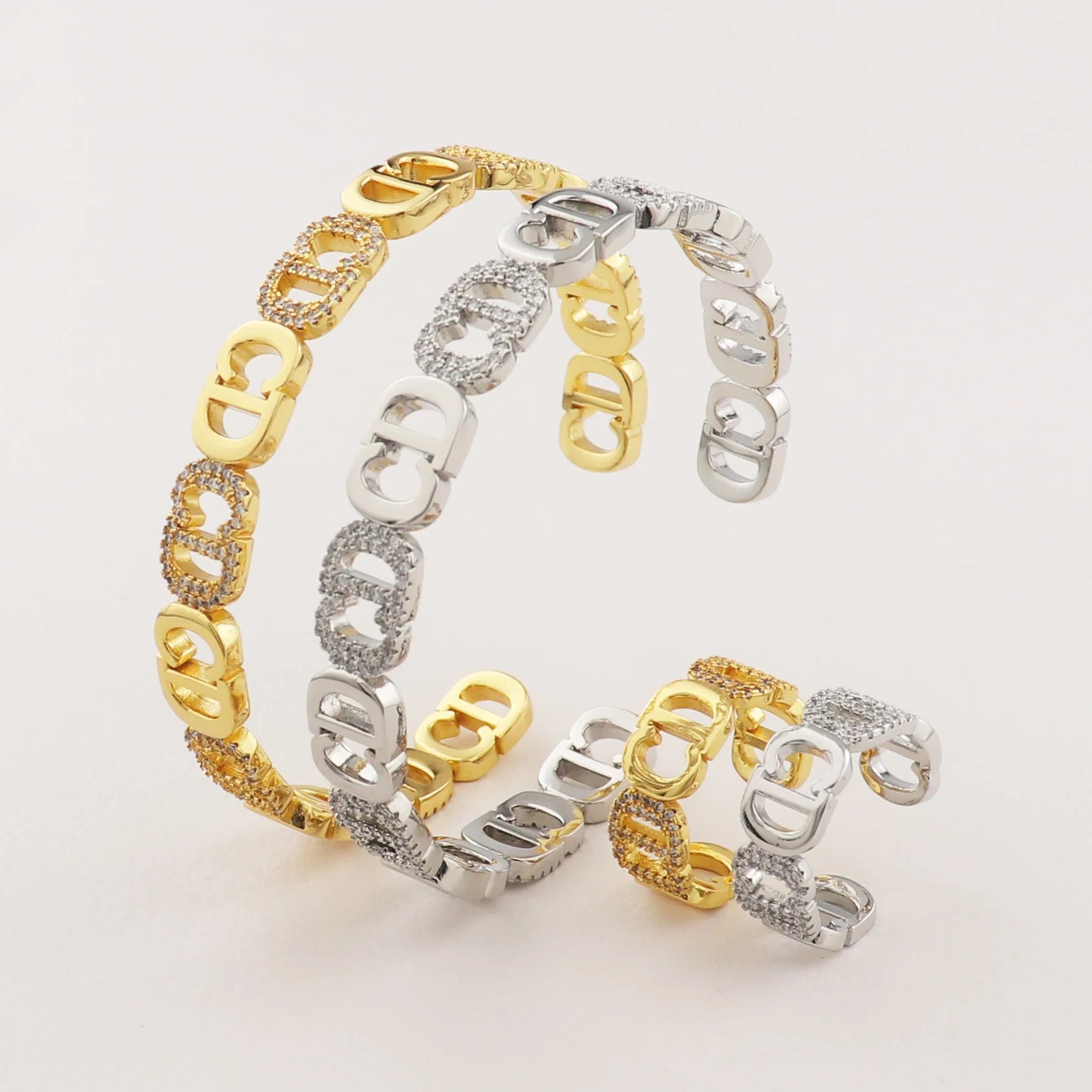Fashion 18k gold plated C&D Letter zircon bangle ring jewelry bangle for women jewelry set
Fashion 18k gold plated C&D Letter zircon bangle ring jewelry bangle for women jewelry set