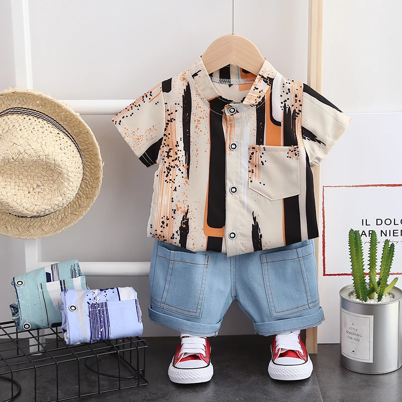 Summer boy stand-up print shirt short sleeve new dress + denim shorts set beautiful boy shirt for children Striped shirt
Summer boy stand-up print shirt short sleeve new dress + denim shorts set beautiful boy shirt for children Striped shirt