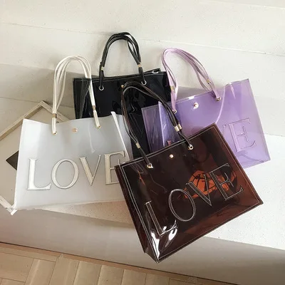 Summer latest letter PVC jelly transparent tote bag fashion large capacity single shoulder bag pvc
Summer latest letter PVC jelly transparent tote bag fashion large capacity single shoulder bag pvc