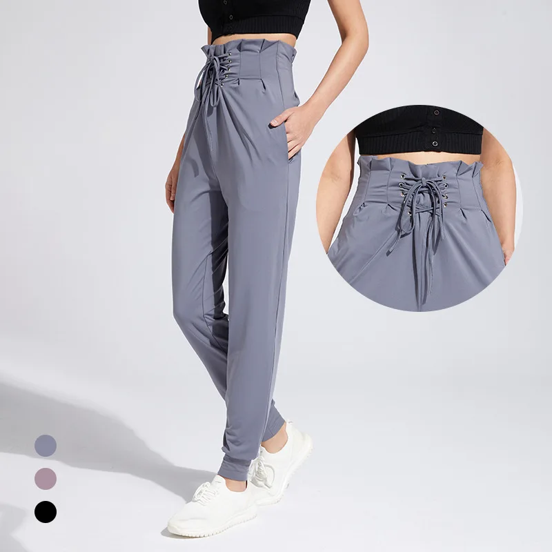 Fashion Drawstring Design Women Sports Pants Breathable Loose Yoga Pants Strappy Trousers
Fashion Drawstring Design Women Sports Pants Breathable Loose Yoga Pants Strappy Trousers