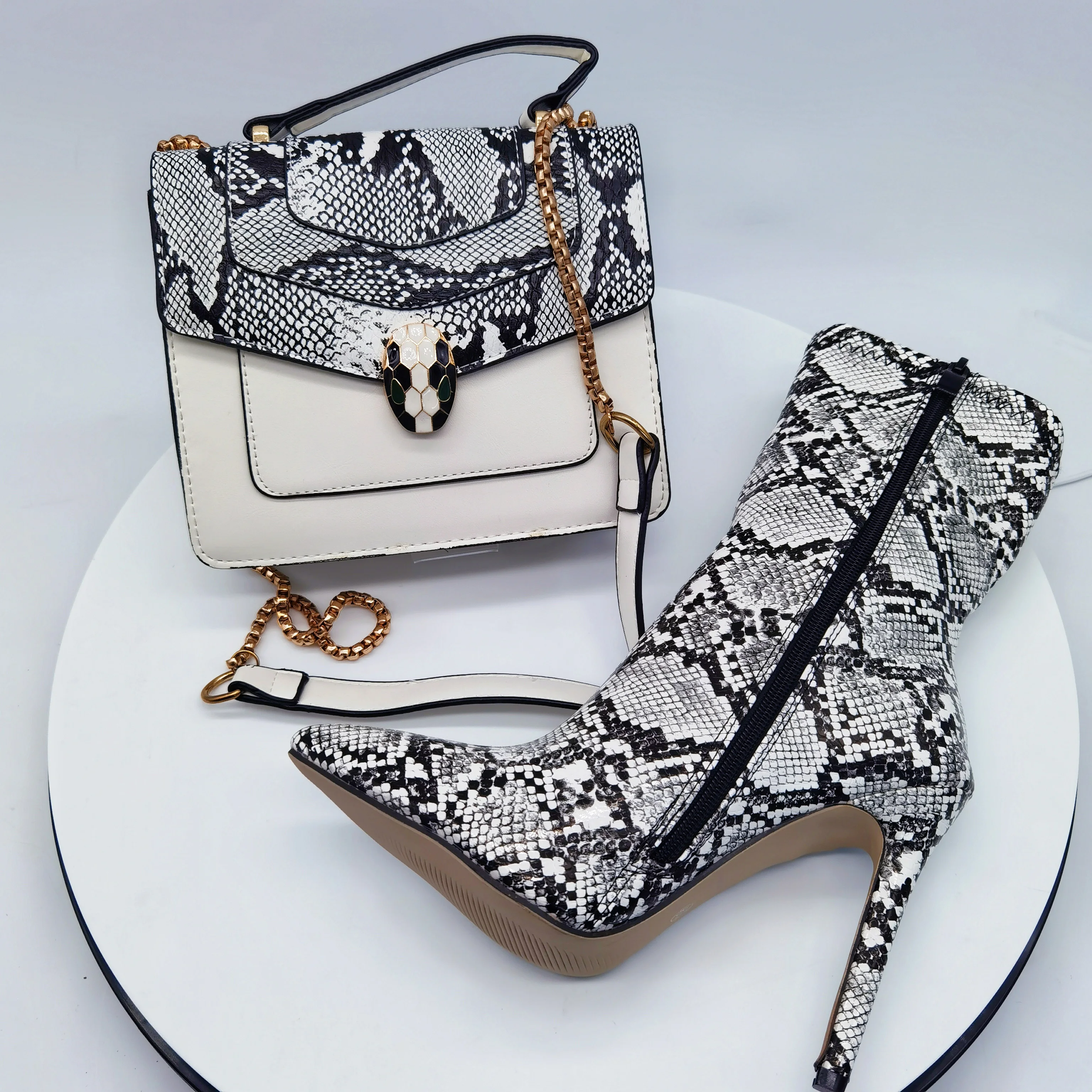 Stylish Ladies Casual Ankle Shoes Sexy High Heel snakeskin Woman Winter boots and handbags set
Stylish Ladies Casual Ankle Shoes Sexy High Heel snakeskin Woman Winter boots and handbags set