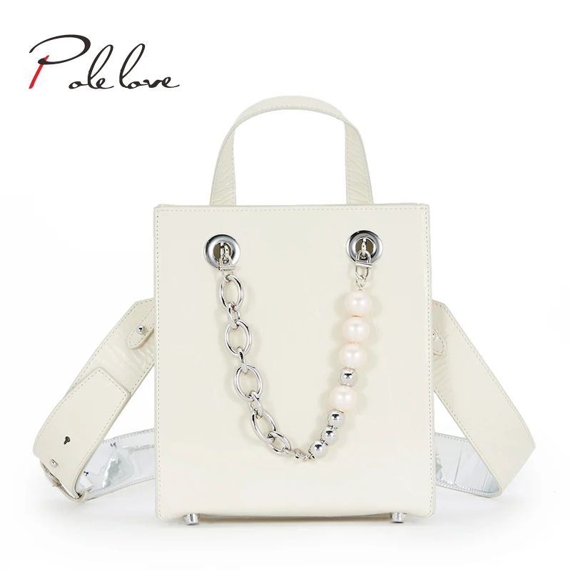 Designer personality creative new electroplating white steel thick shoulder strap messenger bag glass pearl decoration
Designer personality creative new electroplating white steel thick shoulder strap messenger bag glass pearl decoration