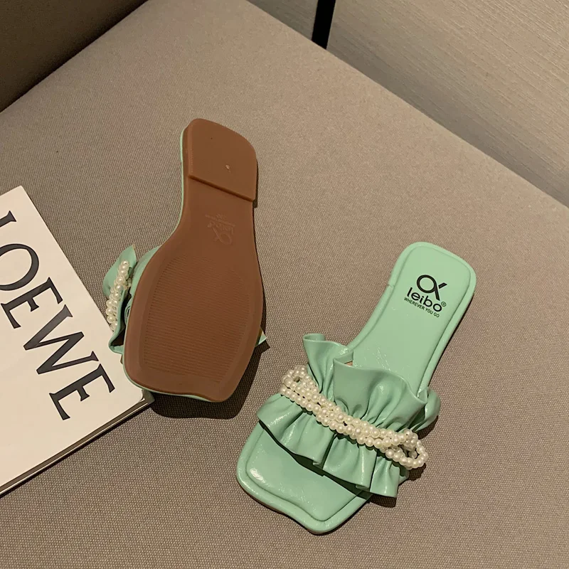 Brand shoes ruffle trim women slippers beaded decor ladies mules square toe padded flat sliders for female summer fashion
Brand shoes ruffle trim women slippers beaded decor ladies mules square toe padded flat sliders for female summer fashion