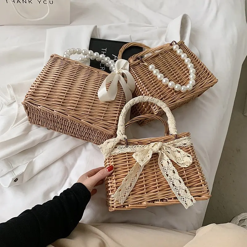 2021 pearl straw bags bow wholesale tote summer straw hand bags beach ladies handbags
2021 pearl straw bags bow wholesale tote summer straw hand bags beach ladies handbags