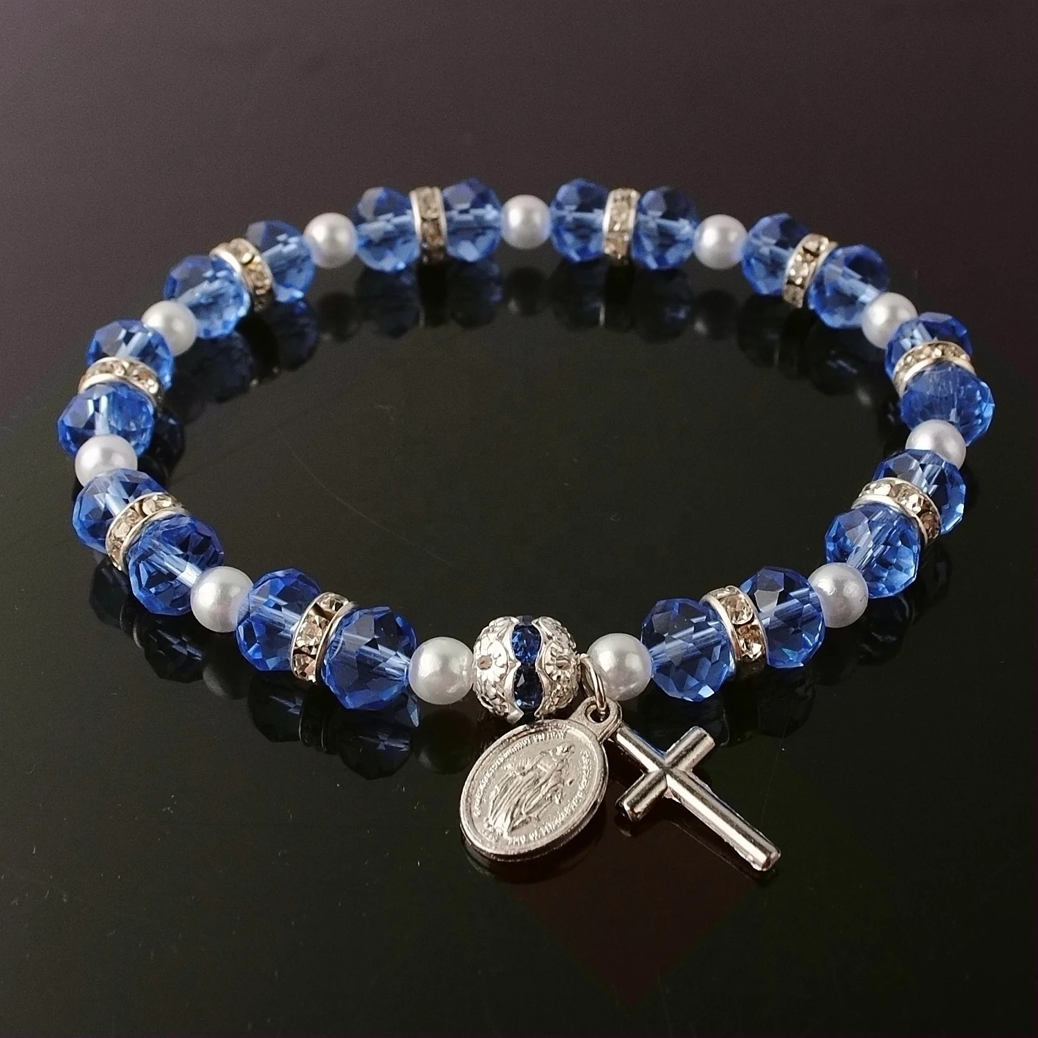 6x8mm Blue Color Crystal Beads with Stone Beads Rosary Bracelet with Cross and Miraculous Medal
6x8mm Blue Color Crystal Beads with Stone Beads Rosary Bracelet with Cross and Miraculous Medal