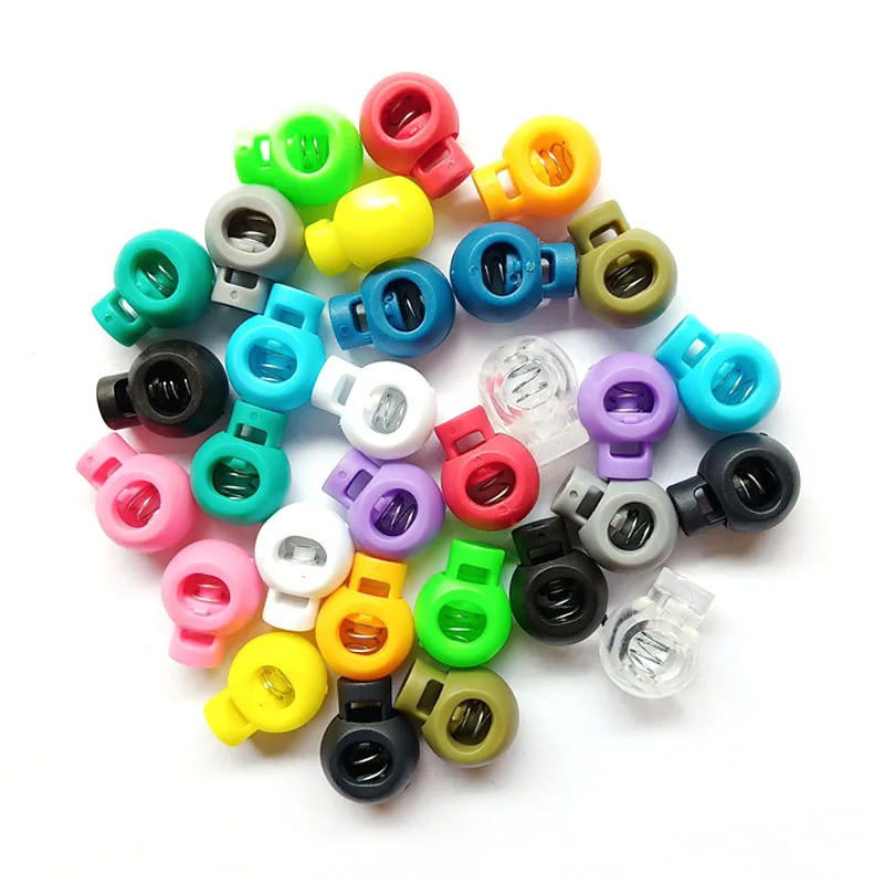 Wholesale high quality wristband lock stopper custom color plastic cord lock, White/ black or custom
Wholesale high quality wristband lock stopper custom color plastic cord lock, White/ black or custom