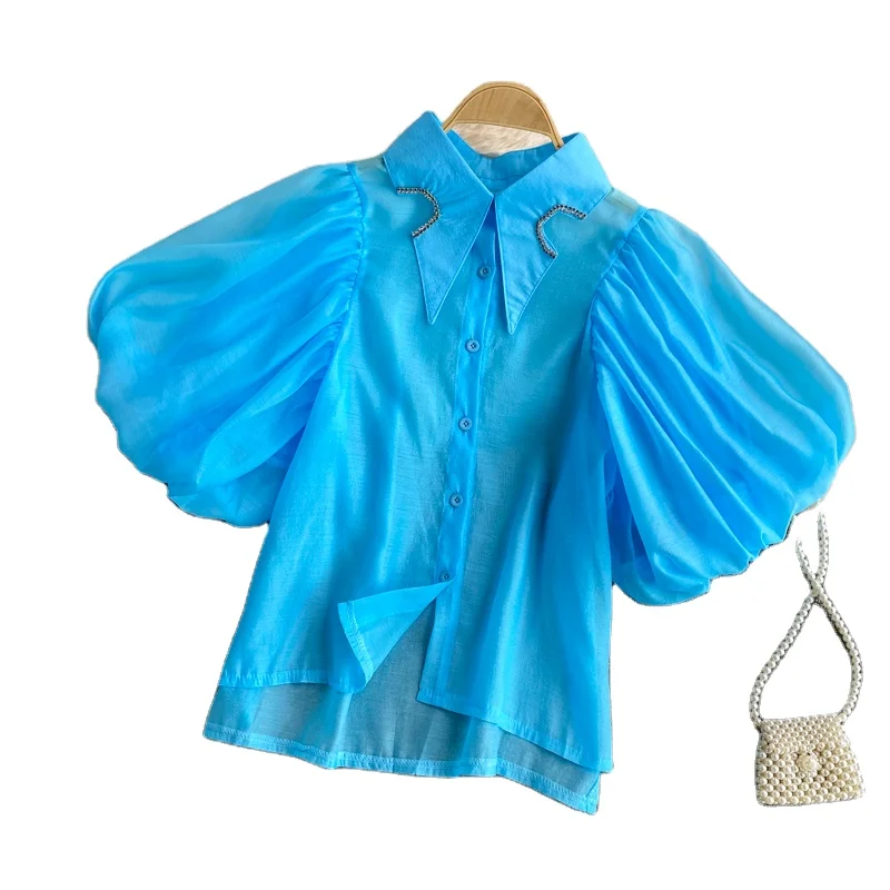 2022 summer solid color Korean version retro style irregular rhinestone shirt lapel puff sleeve shirt single breasted shirt, Can be customized
2022 summer solid color Korean version retro style irregular rhinestone shirt lapel puff sleeve shirt single breasted shirt, Can be customized