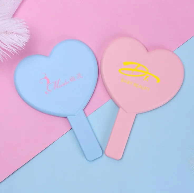 Plastic One Side Heart Shape Hand Mirror Personalized Custom LOGO UV Printing Cosmetic Makeup Handheld Mirror
Plastic One Side Heart Shape Hand Mirror Personalized Custom LOGO UV Printing Cosmetic Makeup Handheld Mirror