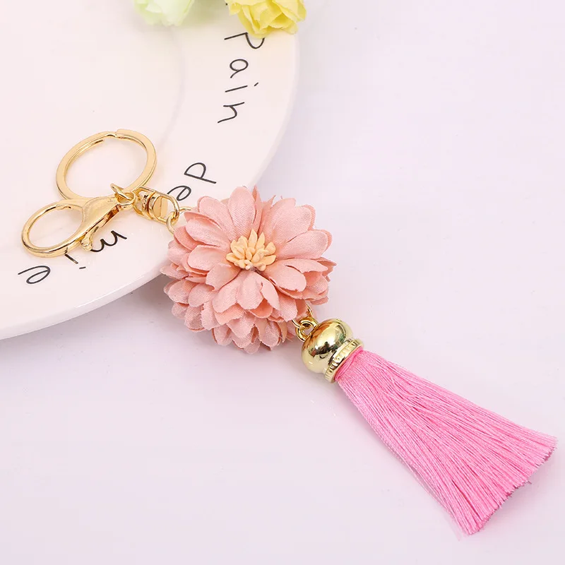 Factory main product colorful flower shaped creative metal silicone soft tassel keychain
Factory main product colorful flower shaped creative metal silicone soft tassel keychain