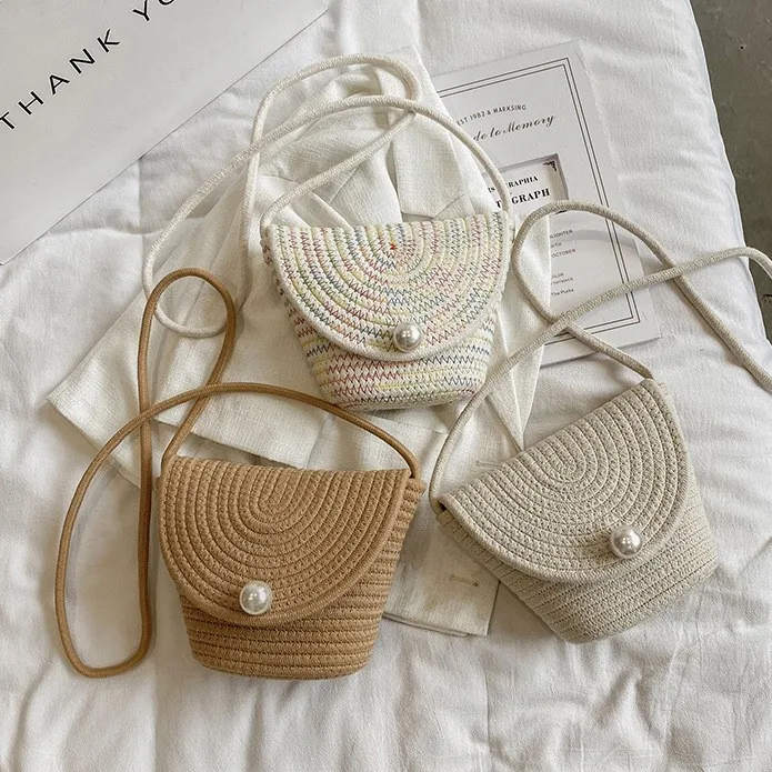New Fashion Lady Hand Woven Bucket Bag with Pearl Decoration Retro Natural Color Women Messenger Bag, Beige khaki color
New Fashion Lady Hand Woven Bucket Bag with Pearl Decoration Retro Natural Color Women Messenger Bag, Beige khaki color