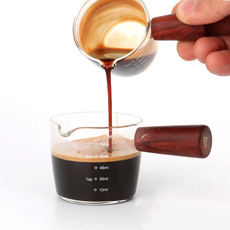 Heat-resistant glass measuring cup with wooden handle jigger for espresso coffee ounce cup 70ml Small milk cup
Heat-resistant glass measuring cup with wooden handle jigger for espresso coffee ounce cup 70ml Small milk cup