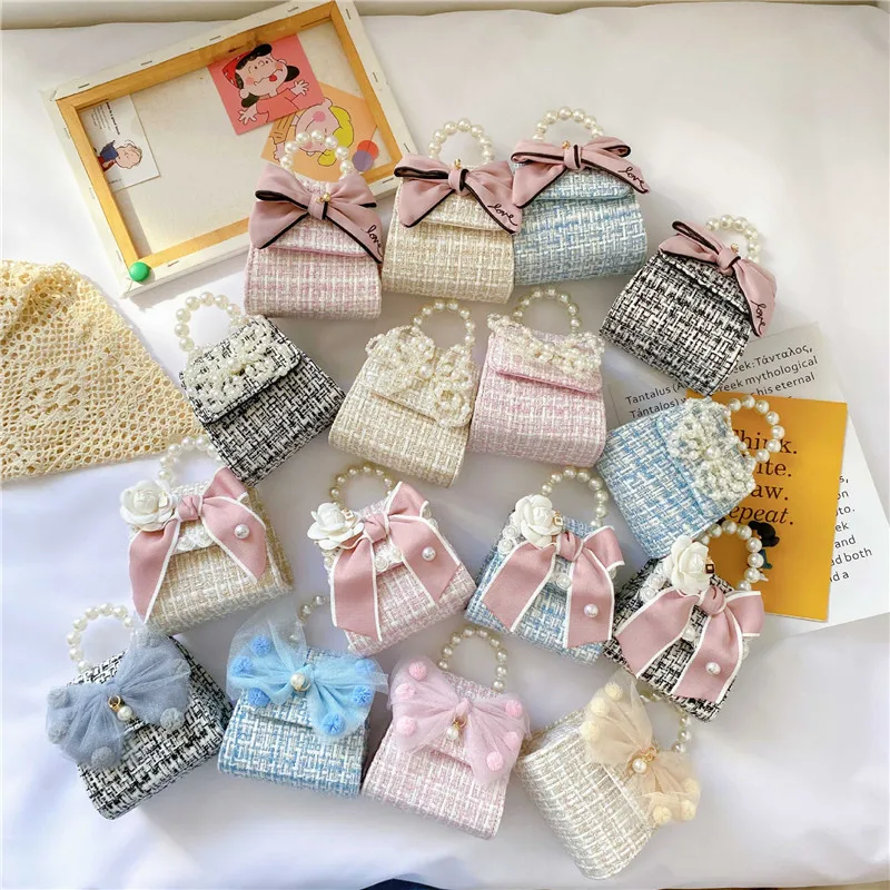 2020 Luxury mini princess handbags kid bags cute girls bow pearls chain shoulder crossbody bag, 16 colors
2020 Luxury mini princess handbags kid bags cute girls bow pearls chain shoulder crossbody bag, 16 colors
