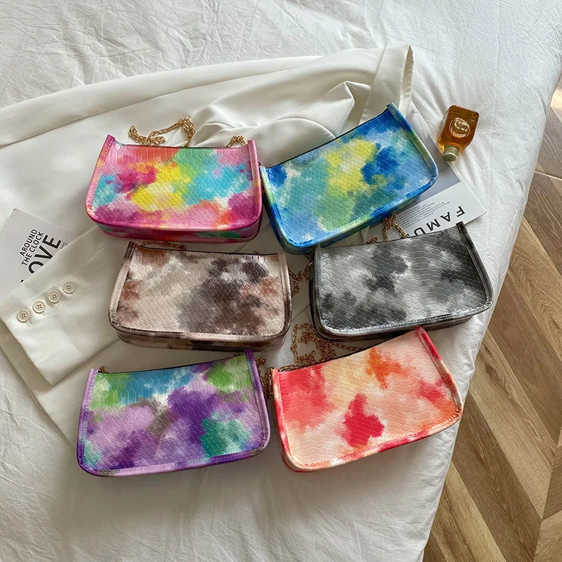 Western hot sale colorful tie-dye style metal chain waterproof oblong ladies' hanbags axillary package
Western hot sale colorful tie-dye style metal chain waterproof oblong ladies' hanbags axillary package