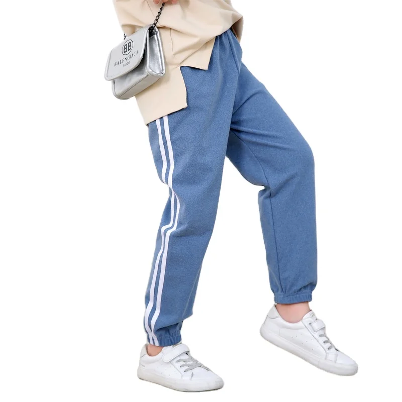 Autumn and winter new boys and girls white side strip casual sports pants children Korean leggings
Autumn and winter new boys and girls white side strip casual sports pants children Korean leggings