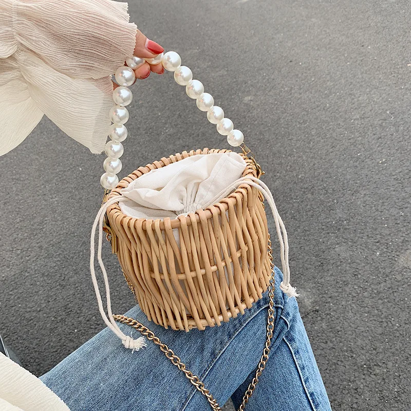 Pearl bag female 2021 new hand-woven handbag straw rattan crossbody bag, As the pics
Pearl bag female 2021 new hand-woven handbag straw rattan crossbody bag, As the pics
