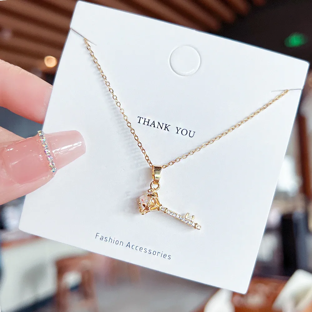 2022 Gold Plated Cubic Zircon Key Pendant Necklace Delicate Stainless Steel Crystal CZ Key Shaped Necklace
2022 Gold Plated Cubic Zircon Key Pendant Necklace Delicate Stainless Steel Crystal CZ Key Shaped Necklace