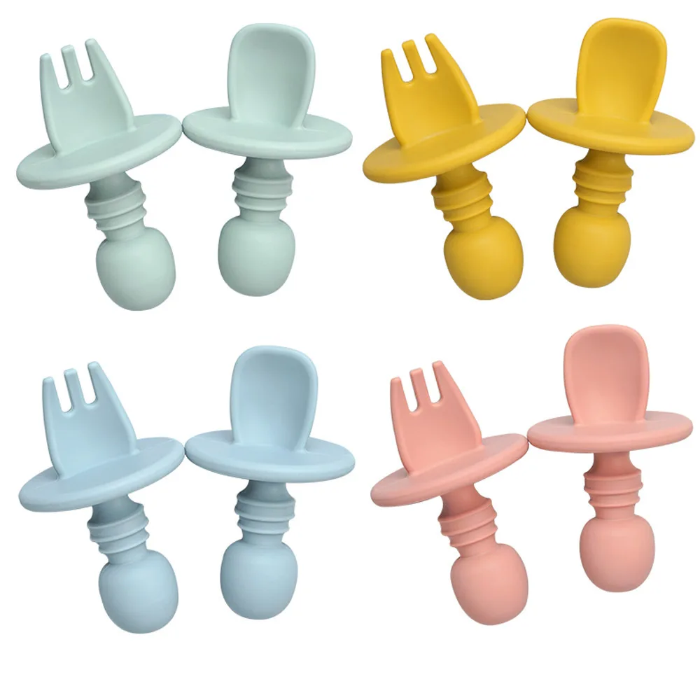 Food Grade Silicone Tableware First Stage Self Feeding Utensils Toddler Led Weaning Training Silicone Baby Spoon and Fork Set
Food Grade Silicone Tableware First Stage Self Feeding Utensils Toddler Led Weaning Training Silicone Baby Spoon and Fork Set