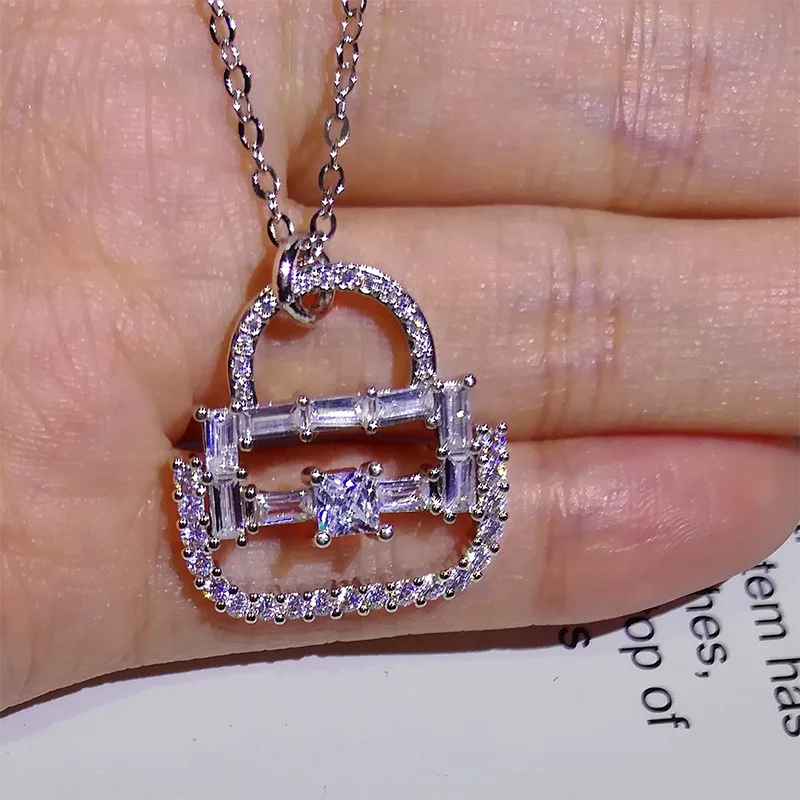 New Fashion Cute Micro Paved Zircon Bag Shaped pendant For Women Girls Elegant Jewelry Gifts
New Fashion Cute Micro Paved Zircon Bag Shaped pendant For Women Girls Elegant Jewelry Gifts