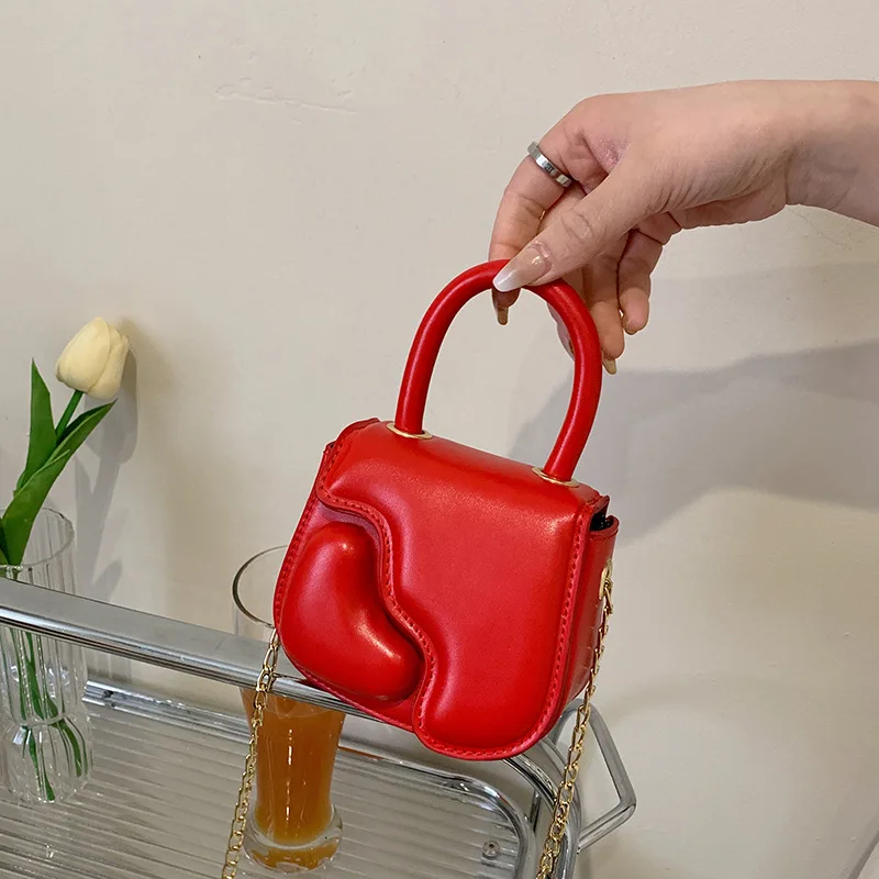 Ins group new mini children's indentation love-shaped hand-held cross-body accessories small cross-bag women's bag
Ins group new mini children's indentation love-shaped hand-held cross-body accessories small cross-bag women's bag