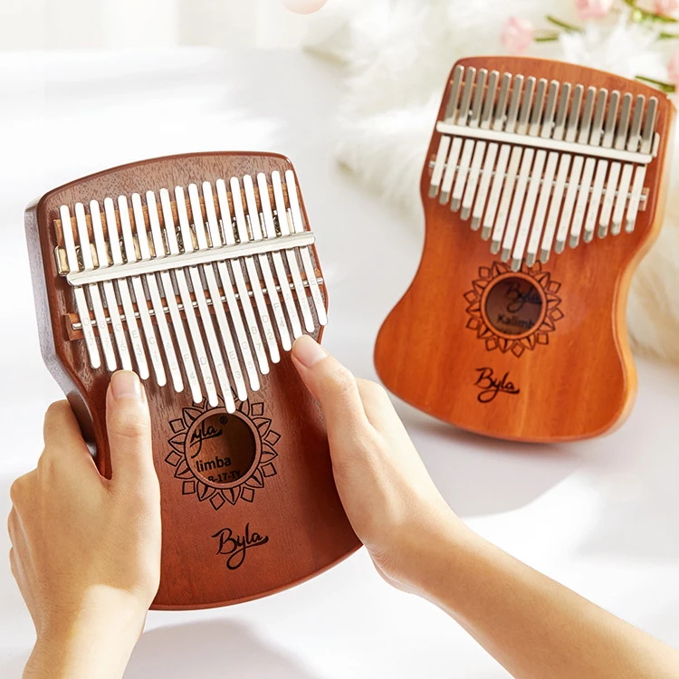Mothers day women gift idea for customers Bally Thumb Piano Two-finger Piano Hand Plucking Portable Finger Piano 
Mothers day women gift idea for customers Bally Thumb Piano Two-finger Piano Hand Plucking Portable Finger Piano